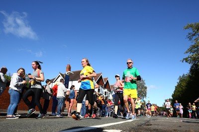 061019 - Cardiff University Cardiff Half Marathon - Runners pass Roath Park Lake