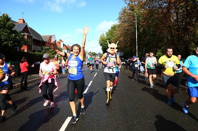 061019 - Cardiff University Cardiff Half Marathon - Runners pass Roath Park Lake