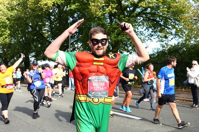 061019 - Cardiff University Cardiff Half Marathon - Runners pass Roath Park Lake