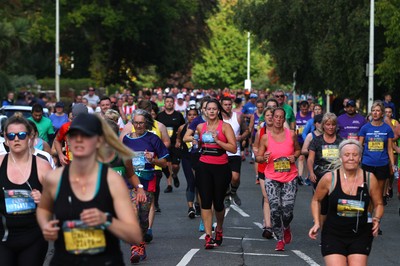 061019 - Cardiff University Cardiff Half Marathon - Runners pass Roath Park Lake