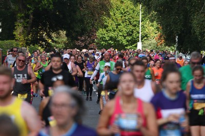 061019 - Cardiff University Cardiff Half Marathon - Runners pass Roath Park Lake