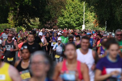 061019 - Cardiff University Cardiff Half Marathon - Runners pass Roath Park Lake