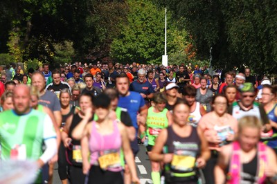 061019 - Cardiff University Cardiff Half Marathon - Runners pass Roath Park Lake