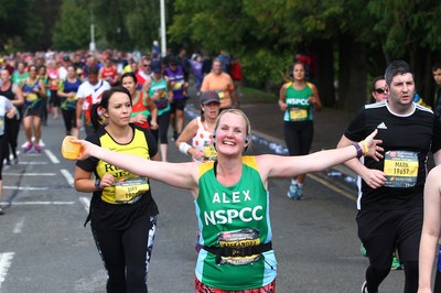 061019 - Cardiff University Cardiff Half Marathon - Runners pass Roath Park Lake