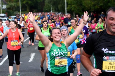 061019 - Cardiff University Cardiff Half Marathon - Runners pass Roath Park Lake