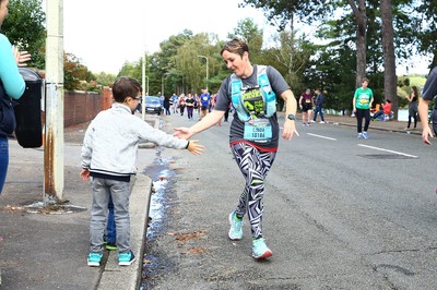 061019 - Cardiff University Cardiff Half Marathon - Runners pass Roath Park Lake