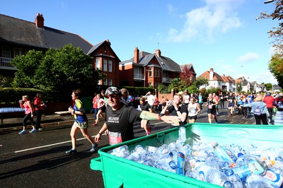 061019 - Cardiff University Cardiff Half Marathon - Runners make full use of the recyclers at Roath Park Lake