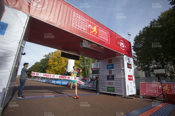 071018 - Cardiff University Cardiff Half Marathon - Winner Jack Rayner of Australia crosses the line