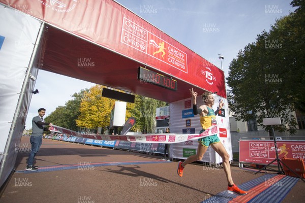 071018 - Cardiff University Cardiff Half Marathon - Winner Jack Rayner of Australia crosses the line