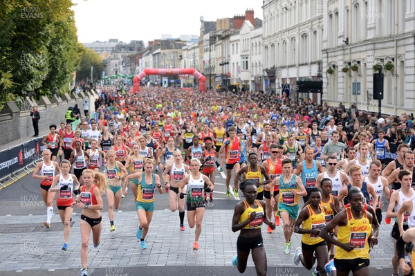 071018 - Cardiff University Cardiff Half Marathon - general view of the start as Juliet Chekwel, the women's winner, goes past 