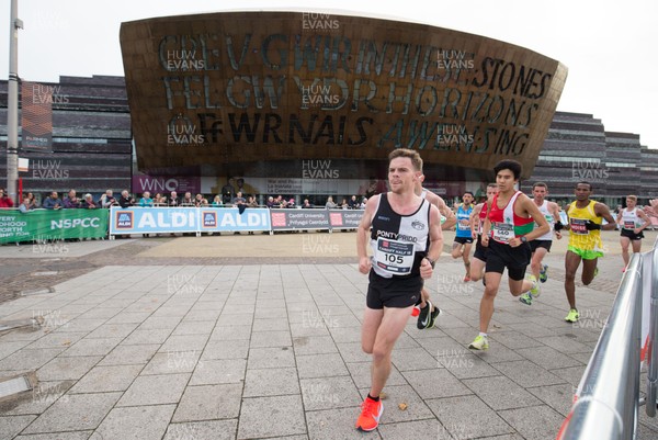 071018 - Cardiff University Cardiff Half Marathon - Elite runners make their way through Roald Dahl Plas and past the Wales Millennium Centre