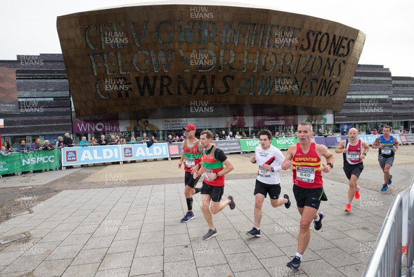 071018 - Cardiff University Cardiff Half Marathon - Elite runners make their way through Roald Dahl Plas and past the Wales Millennium Centre