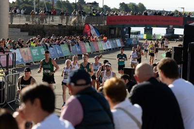 041026 Cardiff Half Marathon - Participants make their way through Cardiff Bay during the 2026 Cardiff Half Marathon