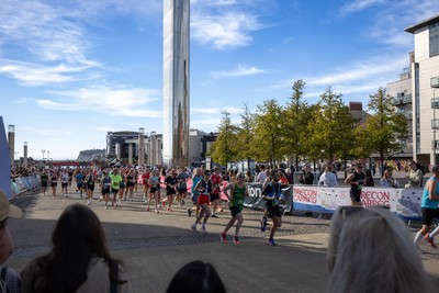 041026 Cardiff Half Marathon - Participants make their way through Cardiff Bay during the 2026 Cardiff Half Marathon