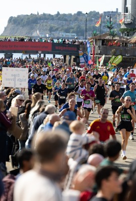 041026 Cardiff Half Marathon - Participants make their way through Cardiff Bay during the 2026 Cardiff Half Marathon