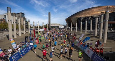 041026 Cardiff Half Marathon - Participants make their way through Cardiff Bay during the 2026 Cardiff Half Marathon