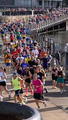 041026 Cardiff Half Marathon - Participants make their way through Cardiff Bay during the 2026 Cardiff Half Marathon