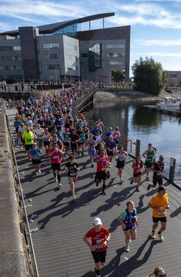 041026 Cardiff Half Marathon - Participants make their way through Cardiff Bay during the 2026 Cardiff Half Marathon