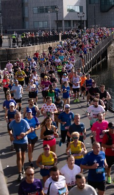 041026 Cardiff Half Marathon - Participants make their way through Cardiff Bay during the 2026 Cardiff Half Marathon