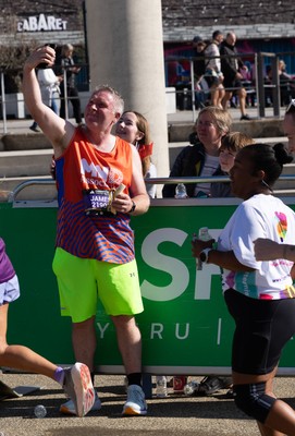 041026 Cardiff Half Marathon - Participants make their way through Cardiff Bay during the 2026 Cardiff Half Marathon