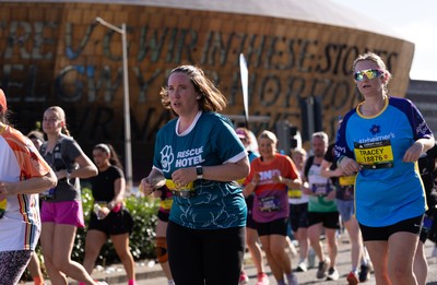 041026 Cardiff Half Marathon - Participants make their way through Cardiff Bay during the 2026 Cardiff Half Marathon