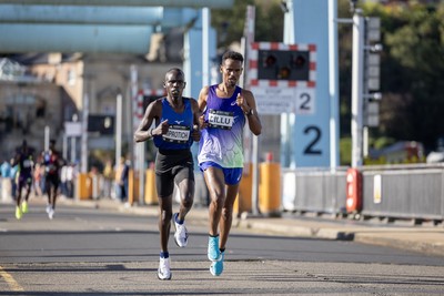 041026 - 2026 Cardiff Half Marathon - Gideon Kiprotich and Yismaw Dillu  at the Cardiff Bay Barrage