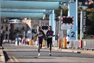 041026 - 2026 Cardiff Half Marathon - Simon Maywa and Jonah Rutio at the Cardiff Bay Barrage