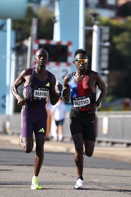 041026 - 2026 Cardiff Half Marathon - Simon Maywa and Jonah Rutio at the Cardiff Bay Barrage