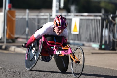 041026 - 2026 Cardiff Half Marathon - Wheelchair athletes cross  the Cardiff Bay Barrage 