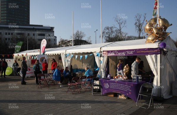 270322 - Cardiff University Cardiff Half Marathon - The Little Princess Trust stall in the runners village ahead of the start of the race