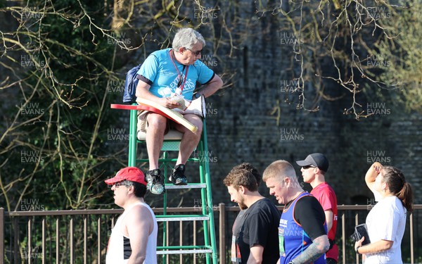 270322 - Cardiff University Cardiff Half Marathon - Volunteers help out at the race