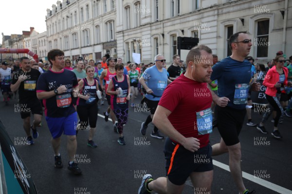 270322 - Cardiff University Cardiff Half Marathon - Runners head off at the start of the race