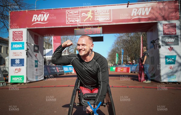 270322 - Cardiff University Cardiff Half Marathon - Sam Kolek after winning the Wheelchair Race