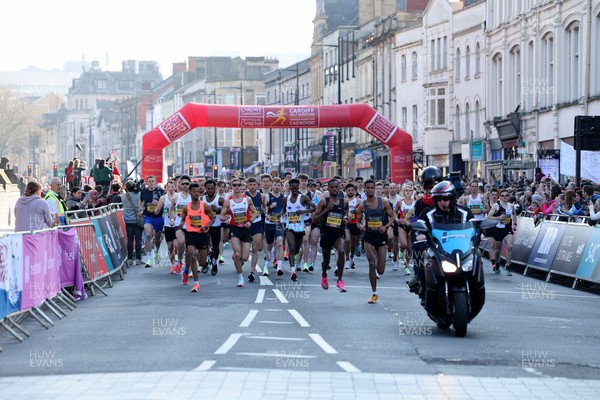 270322 - Cardiff Half Marathon - Runners set off from the start