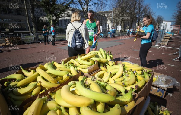 270322 - Cardiff University Cardiff Half Marathon - Bananas are handed out at the end of the race