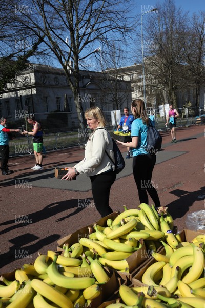 270322 - Cardiff University Cardiff Half Marathon - Bananas are handed out at the end of the race