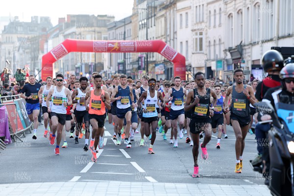 270322 - Cardiff Half Marathon - Runners set off from the start