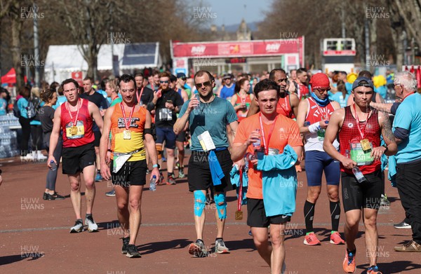 270322 - Cardiff University Cardiff Half Marathon - Runners after finishing the race
