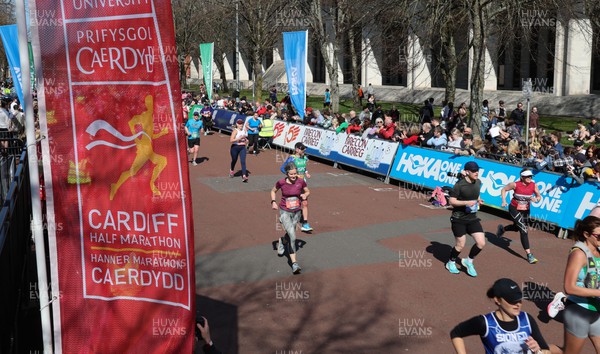 270322 - Cardiff University Cardiff Half Marathon - Runners head towards the finish line as they complete the course