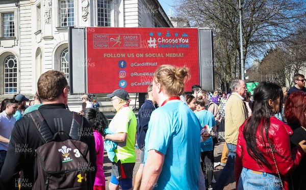 270322 - Cardiff University Cardiff Half Marathon - Information screens in the Race Village