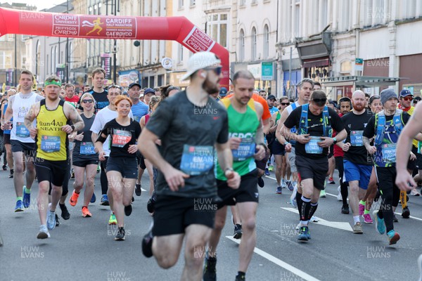 270322 - Cardiff Half Marathon - Runners leave the start 