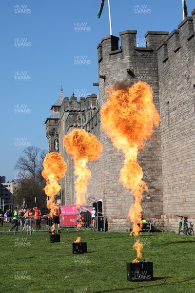 270322 - Cardiff Half Marathon - Flames outside Cardiff Castle at the start 