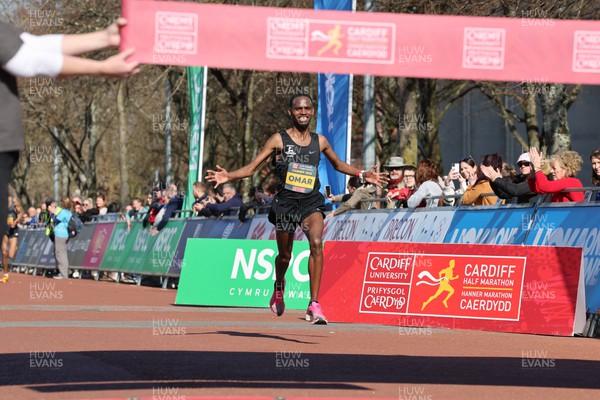 270322 - Cardiff Half Marathon - Winner of the men's race in 1:02:46 Kadar Omar