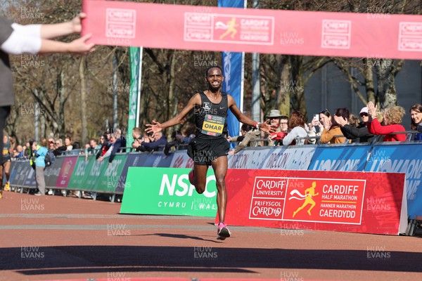270322 - Cardiff Half Marathon - Winner of the men's race in 1:02:46 Kadar Omar