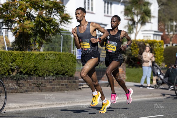 270322 - Cardiff University Cardiff Half Marathon - Elite Men's race leaders Mahamed Mahamed and Kadar Omar at Roath Park