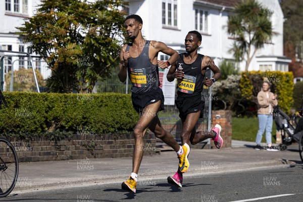 270322 - Cardiff University Cardiff Half Marathon - Elite Men's race leaders Mahamed Mahamed and Kadar Omar at Roath Park
