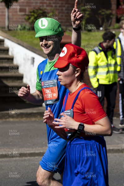 270322 - Cardiff University Cardiff Half Marathon - Runners in Mario and Luigi costumes at Roath Park