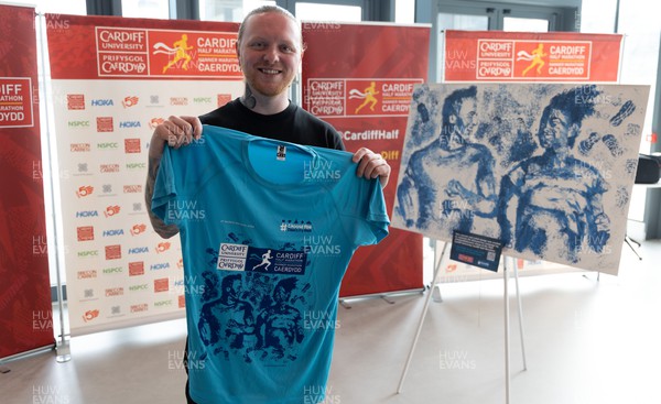 210322 Cardiff University Cardiff Half Marathon Event and Race T Shirt Reveal - Artist Nathan Wyburn with the artwork and finished race T shirt for the Cardiff University Cardiff Half Marathon