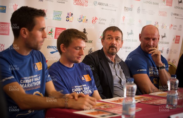 300915 - Cardiff Half Marathon 2015 Press Conference, City Hall, Cardiff - England's Ryan McLeod, Wales' Dewi Griffiths former marathon world record holder and current British Marathon record holder Steve Jones, with Wales and British Lions Legend Gareth Thomas who has a team of women from the valley town of Deri running in the race at the press conference ahead of the Cardiff Half Marathon on the 4th of October