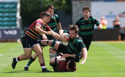 100525 - Cardiff Met Athletic v St Peters Athletic, Mens Division 5 Cup Final - Tom Bainbridge of St Peters Athletic is tackled